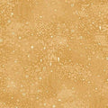 A close-up of a gold and beige patterned fabric or wallpaper featuring abstract geometric and organic motifs.