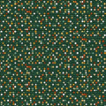 A close-up of a mosaic tile pattern featuring a dark green background with numerous small square tiles in white, yellow, orange, and brown.