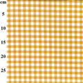 A close-up of a yellow and white gingham checkered fabric pattern with a vertical cm measurement scale on the left side.