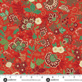 Floral pattern fabric with a ruler at the bottom for scale, on a red background.