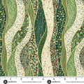 A close-up of a patterned fabric with vertical wavy bands in green, beige, and cream, decorated with swirls, dots, and small geometric motifs. A white ruler strip with Andover branding and measurement markings runs along the bottom edge.