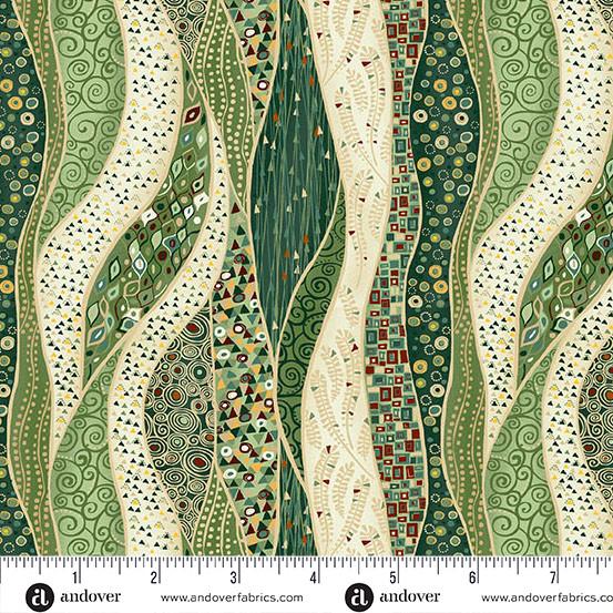A close-up of a patterned fabric with vertical wavy bands in green, beige, and cream, decorated with swirls, dots, and small geometric motifs. A white ruler strip with Andover branding and measurement markings runs along the bottom edge.