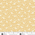 Pattern of white deer and flowers on a yellow background with a ruler for scale.