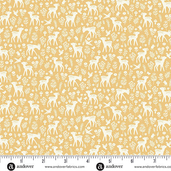 Pattern of white deer and flowers on a yellow background with a ruler for scale.