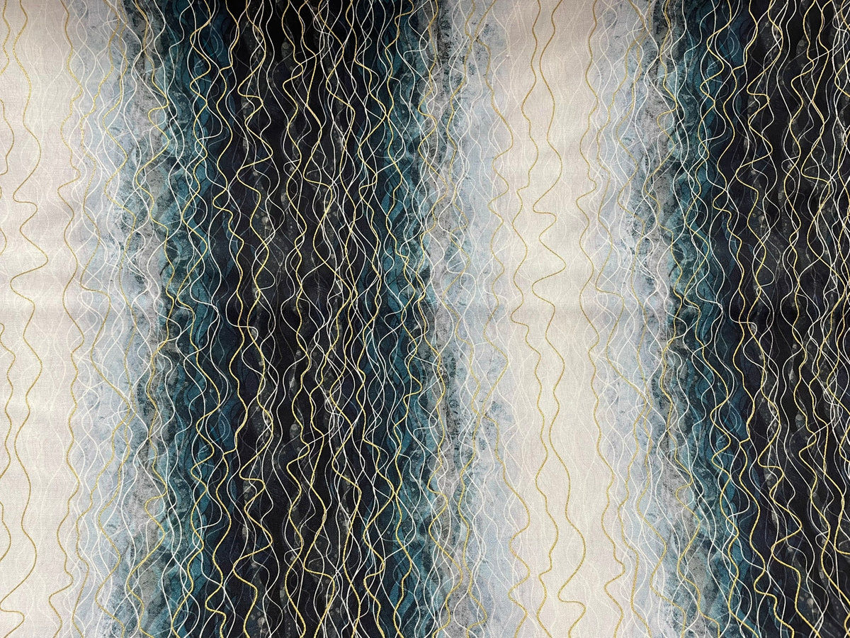 Abstract textile featuring vertical wavy lines in cream, teal, blue, and black, with fine gold-toned thread-like overlays.