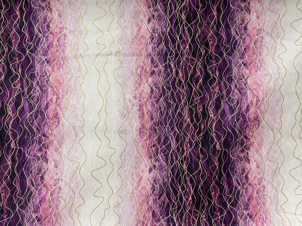A close-up of a textured fabric featuring vertical wavy stripes in shades of purple, pink, and black, overlaid with fine gold-colored stitched lines.