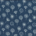 A close-up of a navy blue fabric with a repeating white dandelion print.