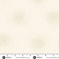 A fabric pattern swatch showing a cream background with small olive green dots arranged in horizontal bands of increasing density. A ruler and Andover brand markings are visible along the bottom edge.