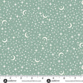 Fabric pattern with stars and moons on a green background, featuring Andover Fabrics branding.