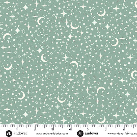 Fabric pattern with stars and moons on a green background, featuring Andover Fabrics branding.