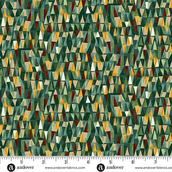 A close-up of a fabric pattern featuring a dense, geometric triangle mosaic in shades of forest green, olive, mustard yellow, rust red, and cream. A white ruler with black markings and the 'andover' brand logo is visible along the bottom edge.