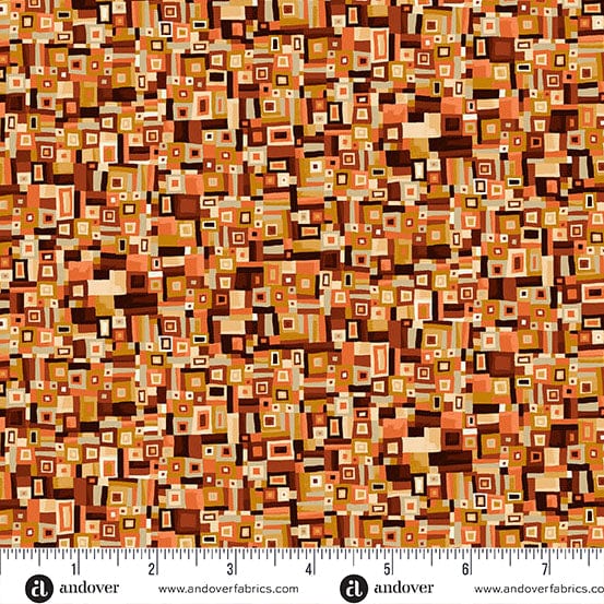 A close-up of a fabric pattern featuring a dense, mid-century modern geometric design of nested squares and rectangles in warm tones of orange, brown, beige, and white. A white ruler with black markings and the brand name 'andover' is visible along the bottom edge.
