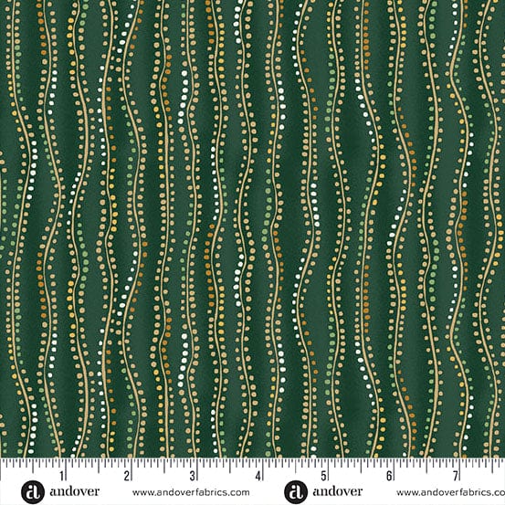 Dark green fabric with a repeating pattern of vertical wavy lines decorated with dotted rows of gold, white, and light green beads. A white measurement ruler is visible along the bottom edge with the brand name 'andover' printed on it.